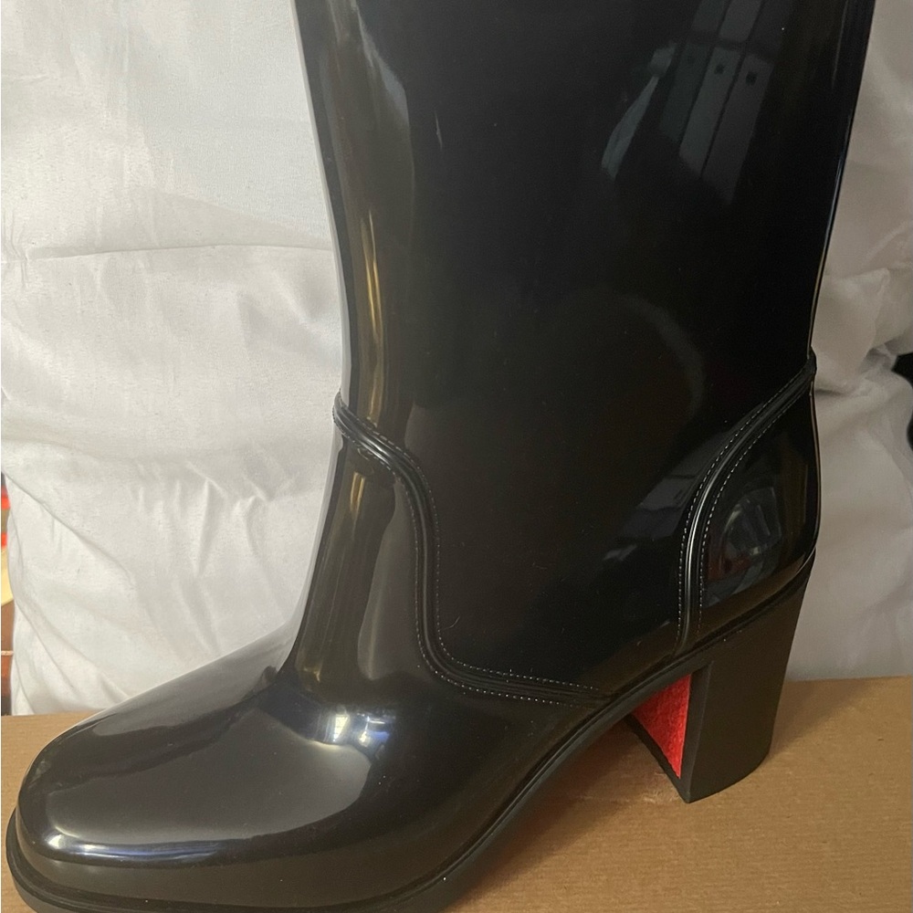 These are Louboutin size 39 rubber boots, these have never been worn!❤️